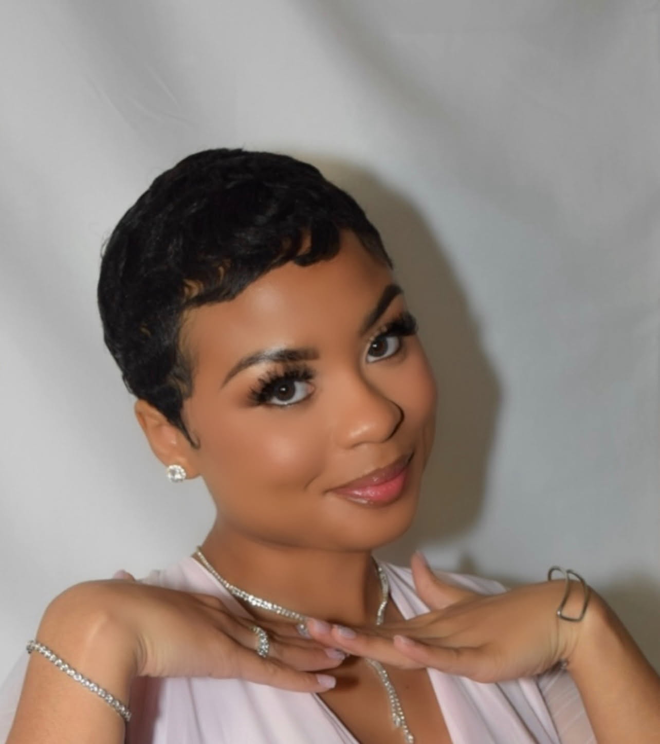 Elegant portrait of a Knighton family member in pink with jewelry