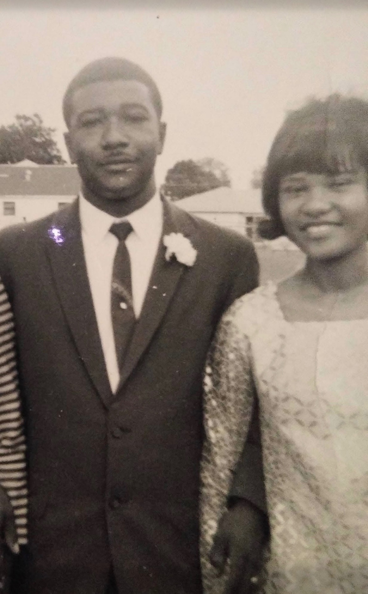 Vintage black-and-white photo of a Knighton couple dressed for a special occasion