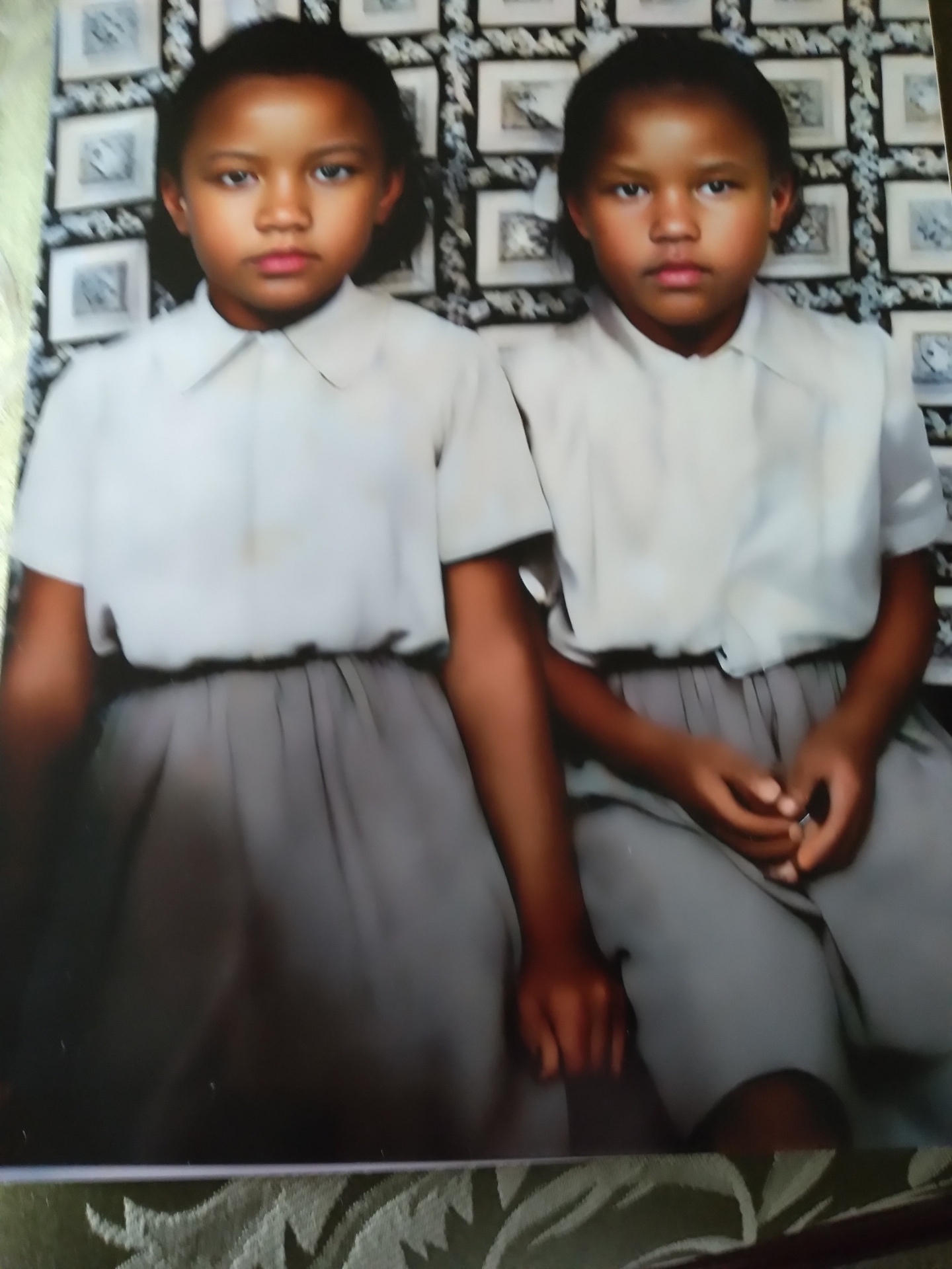Two young Knighton sisters posing together