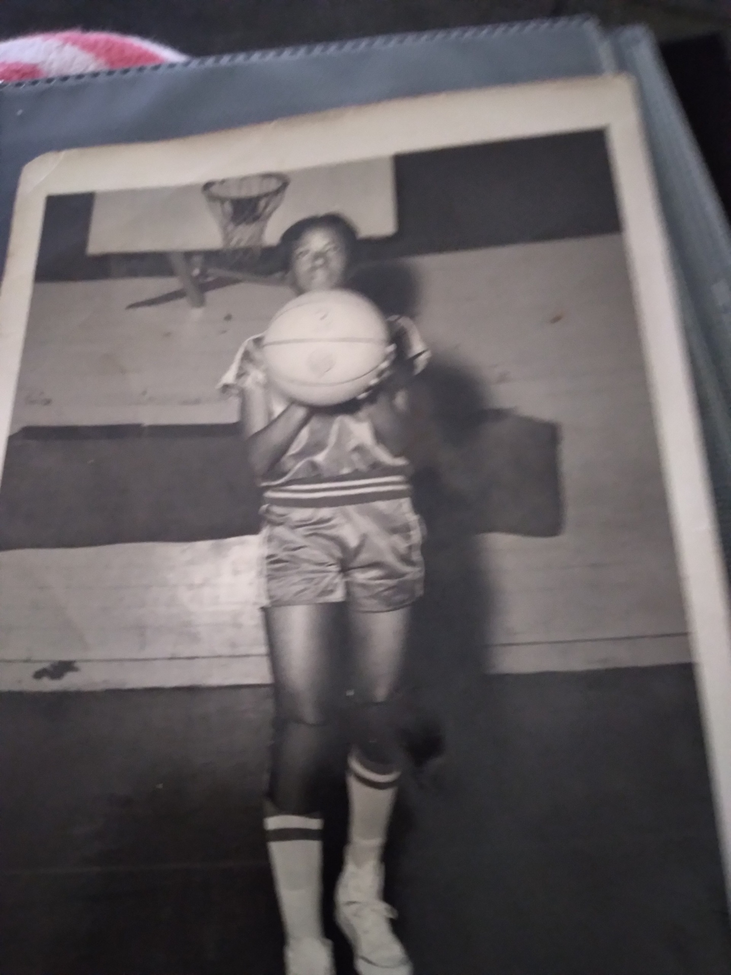 Young Knighton family member in a basketball uniform