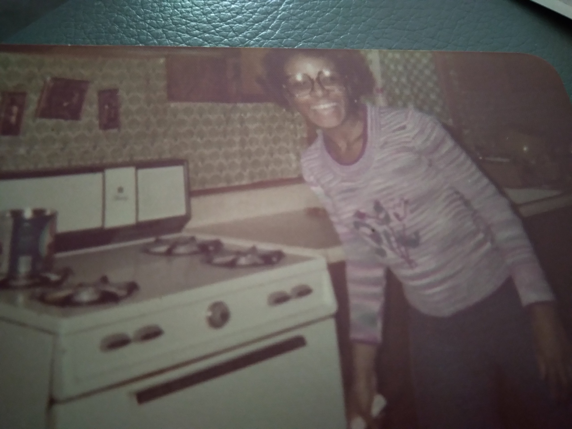 Knighton family member smiling in the kitchen