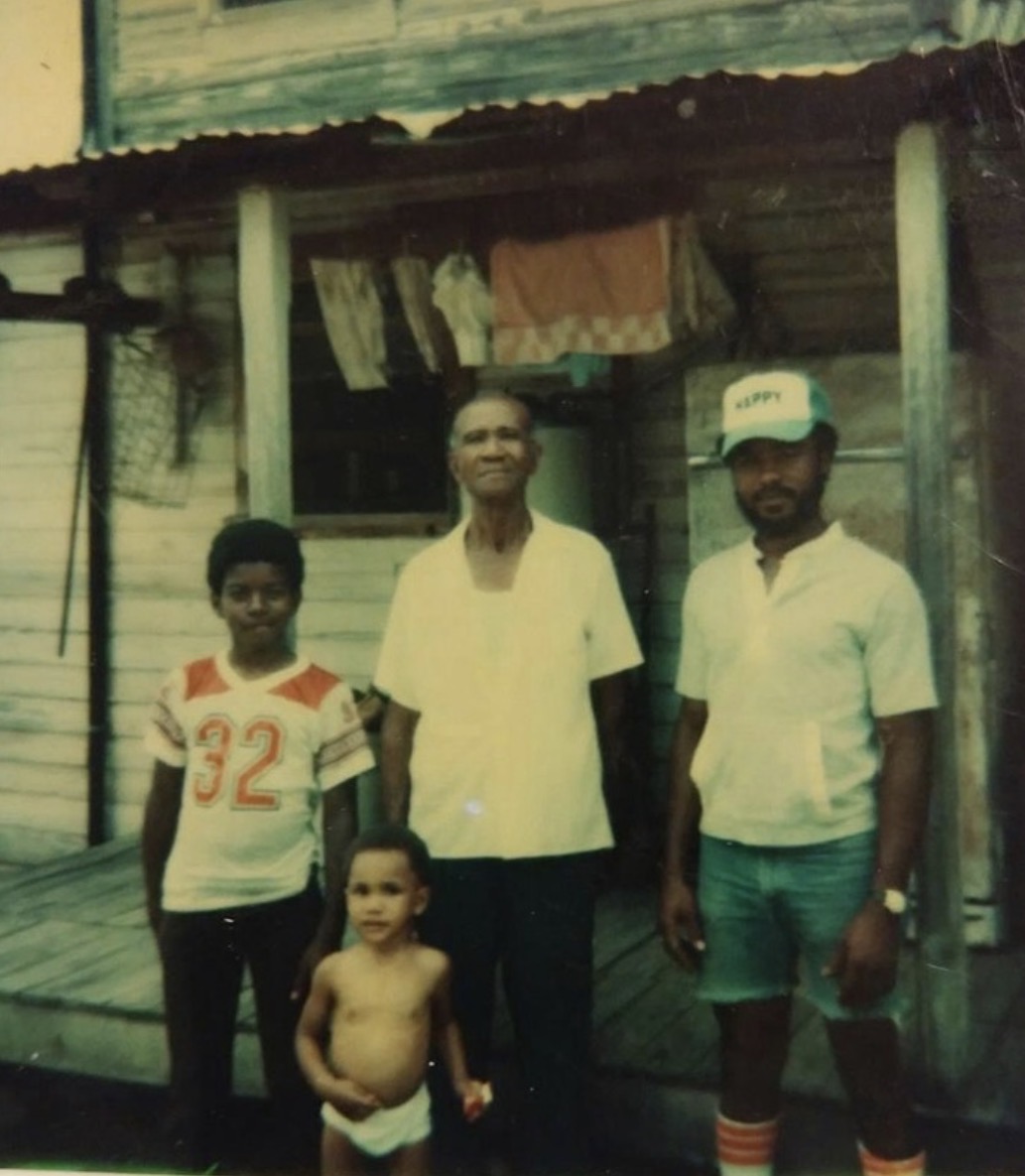 Three generations of Knighton family on the porch