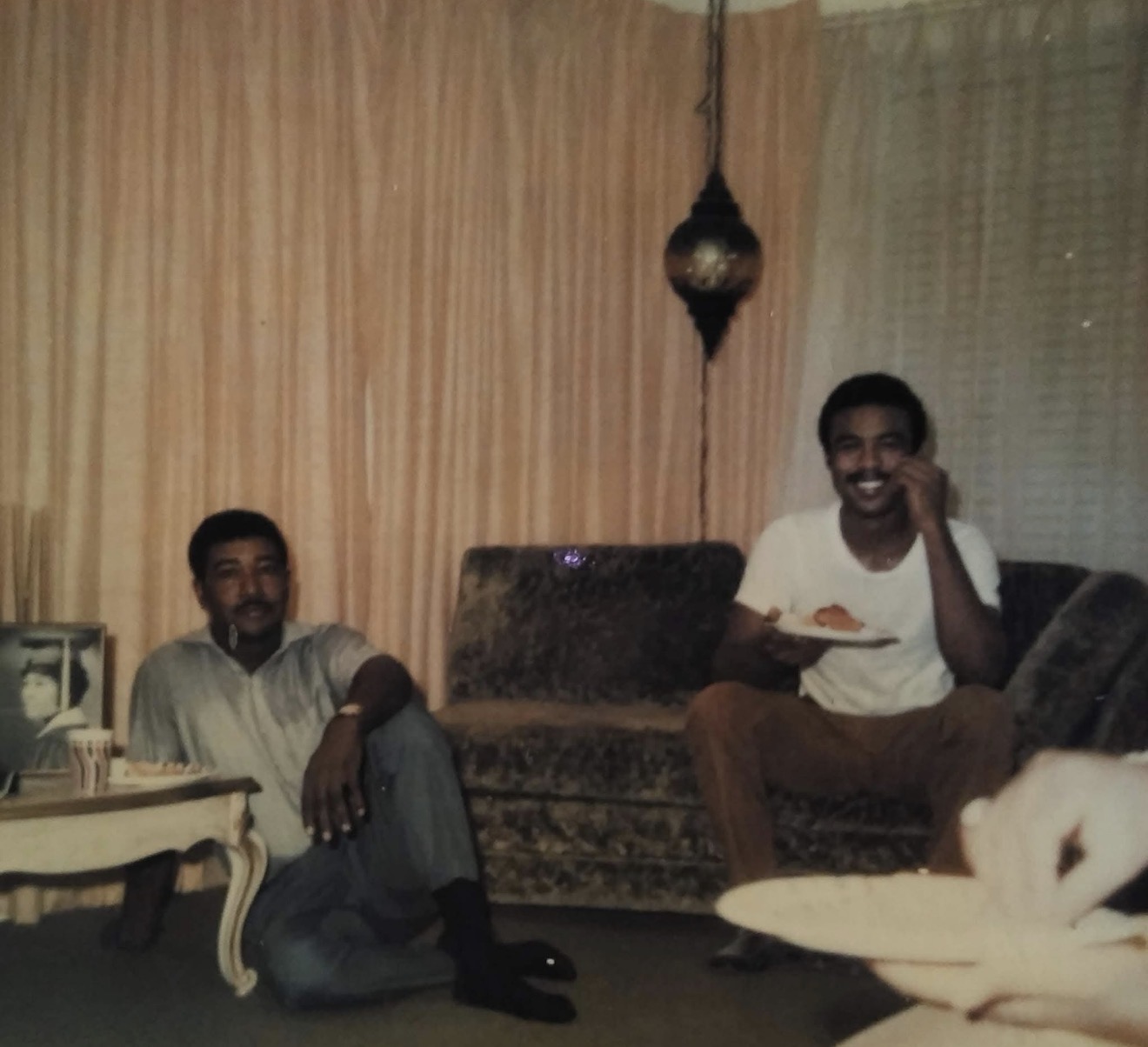 Two Knighton men relaxing together at home