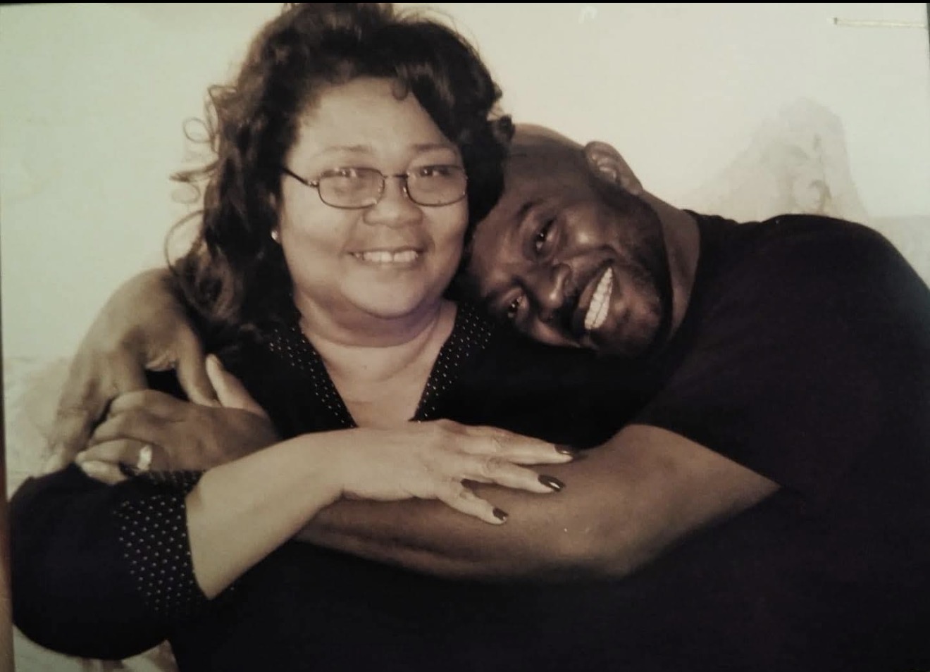 Knighton couple sharing a warm embrace